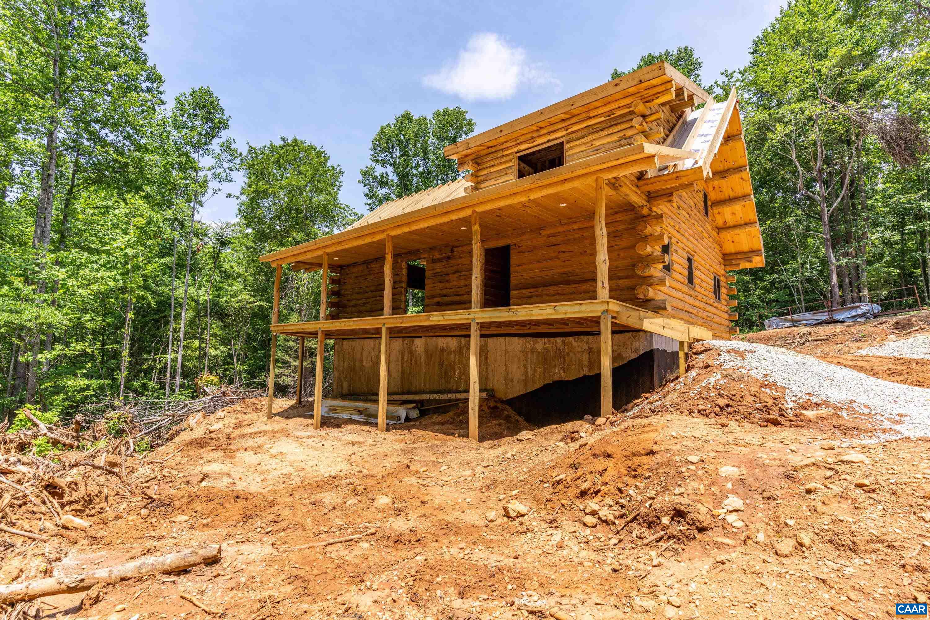 755 Roses Mill Road Amherst, VA 24521 - Photo 50 of 62 a view of a house with a yard and garage