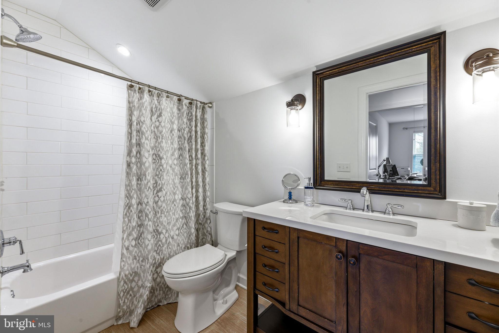 4126 Hedgehill Lane Phoenix, MD 21131 - Photo 35 of 54 a bathroom with a sink a toilet and shower