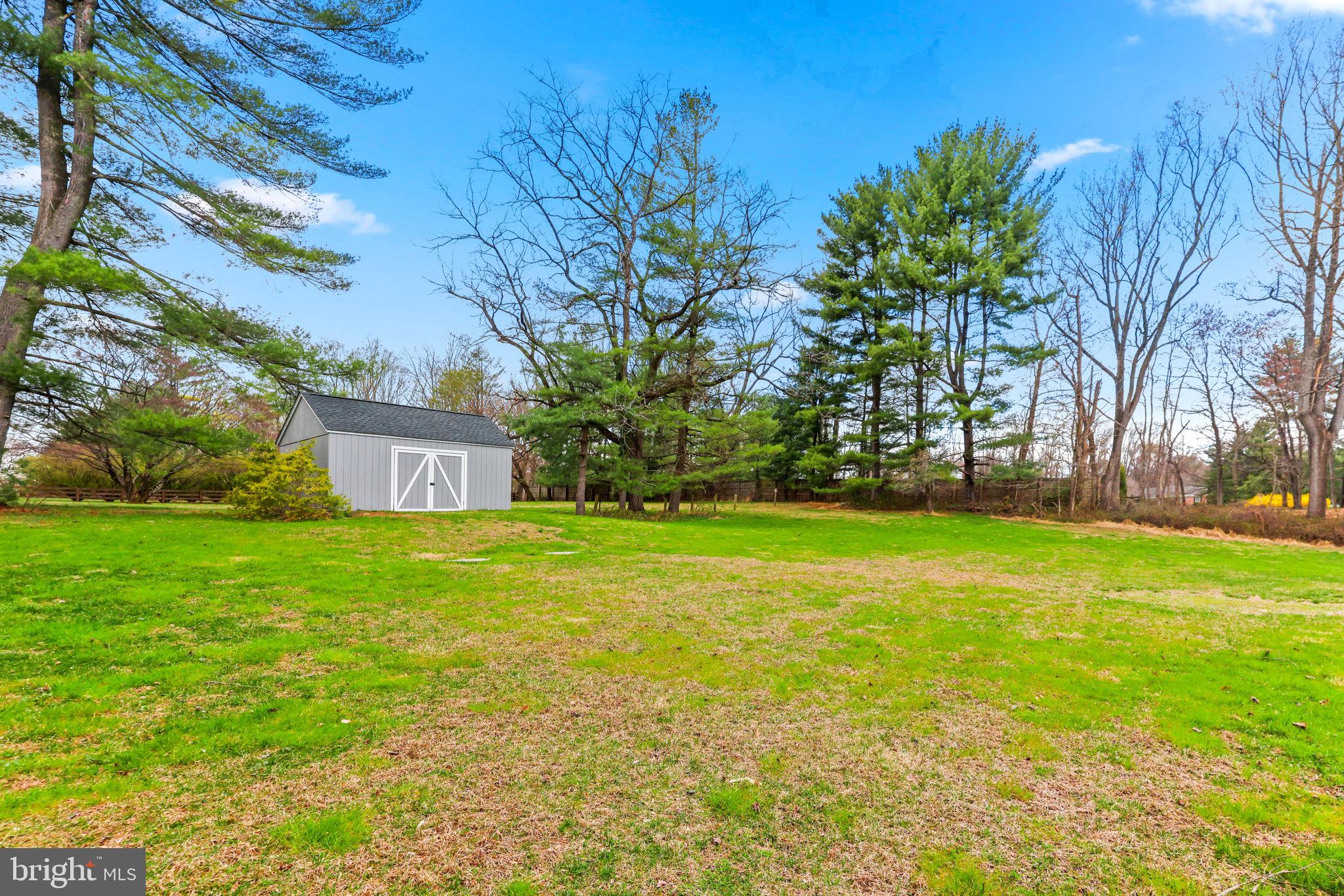 4126 Hedgehill Lane Phoenix, MD 21131 - Photo 44 of 54 a view of a big yard with large trees