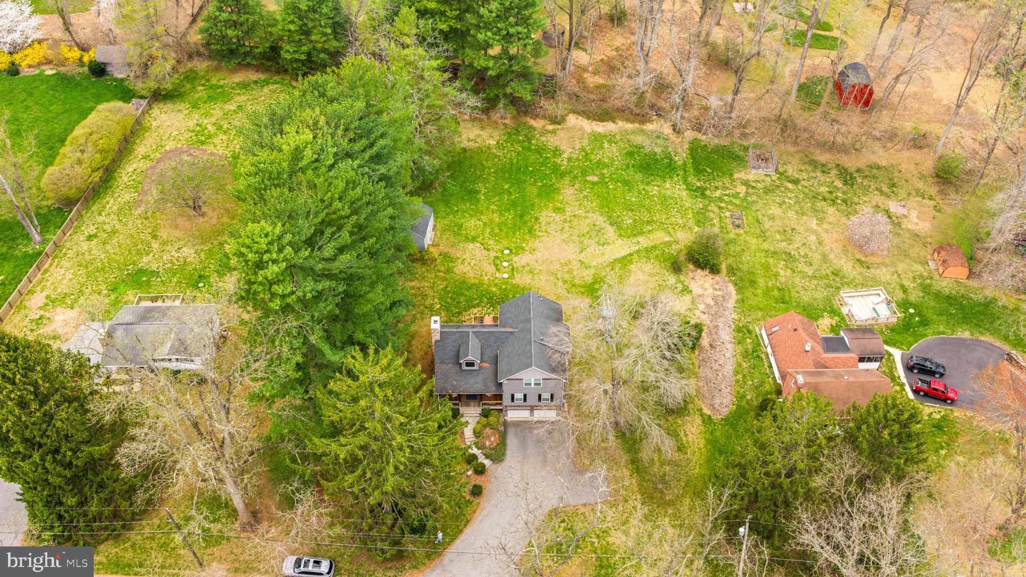 4126 Hedgehill Lane Phoenix, MD 21131 - Photo 48 of 54 a aerial view of residential houses with yard