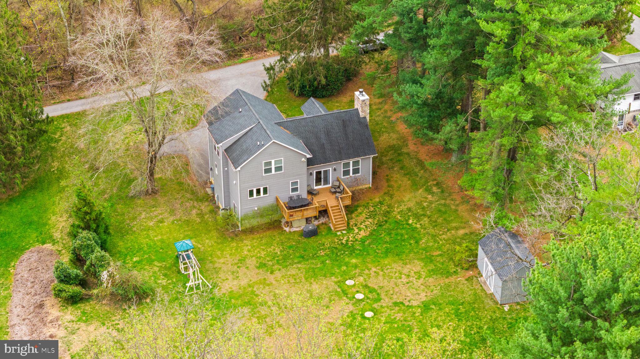 4126 Hedgehill Lane Phoenix, MD 21131 - Photo 50 of 54 an aerial view of residential houses with outdoor space and trees