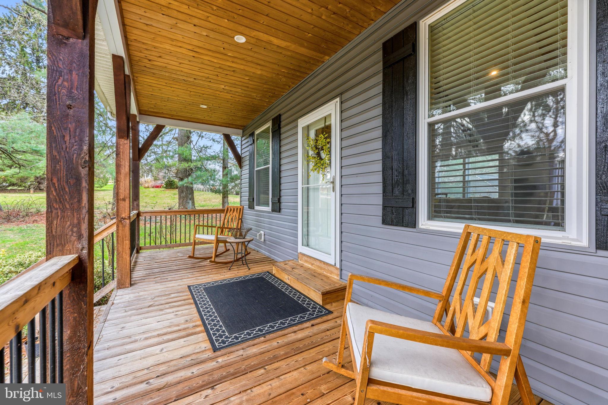 4126 Hedgehill Lane Phoenix, MD 21131 - Photo 8 of 54 a outdoor space with wooden floor and furniture