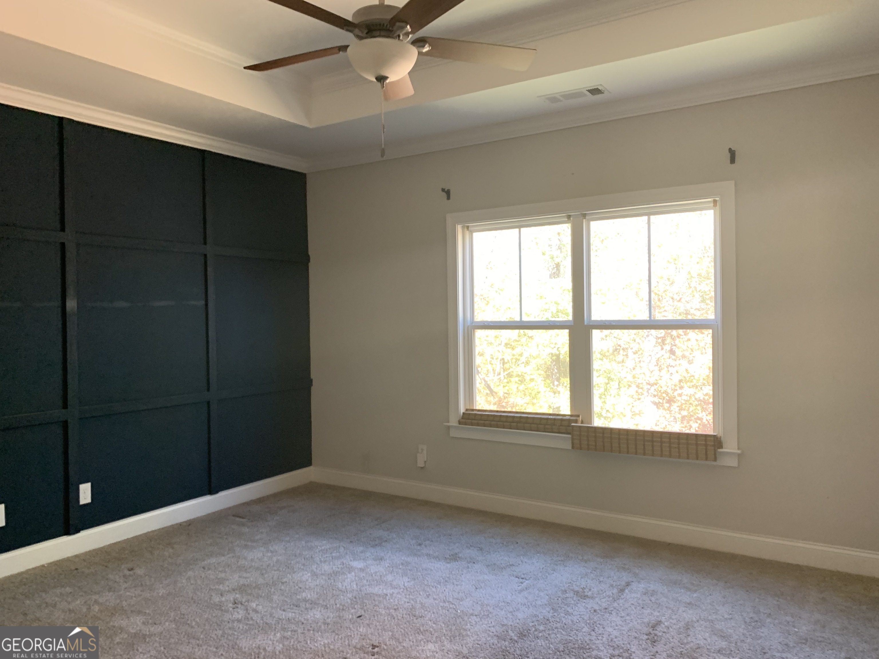 30 Hollyhock Lane Covington, GA 30014 - Photo 5 of 8 a view of an empty room with a window