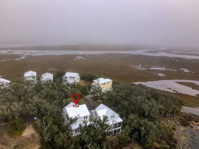 a view of water and mountain in the back