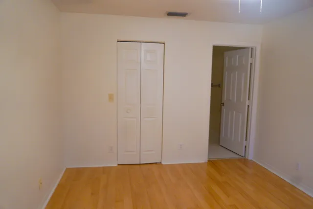 a view of small space with wooden floor