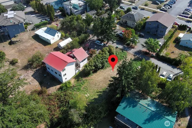 an aerial view of a house with a garden
