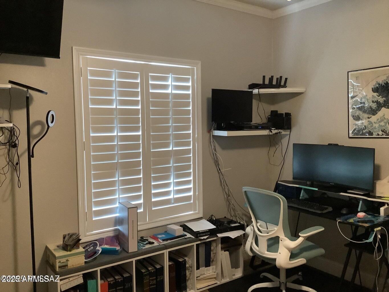 3736 Jackson Lane Willcox, AZ 85643 - Photo 13 of 36 a view of a workspace with furniture and a window