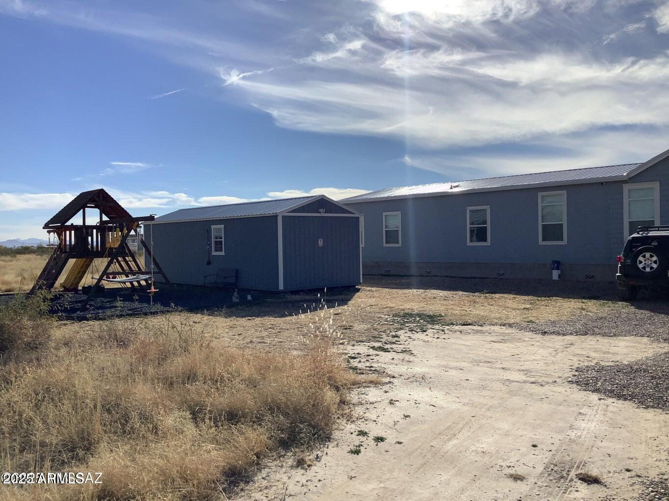 3736 Jackson Lane Willcox, AZ 85643 - Photo 28 of 36 a view of a backyard of a house