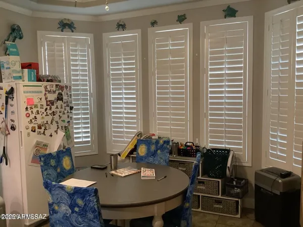 a view of a dining room with furniture