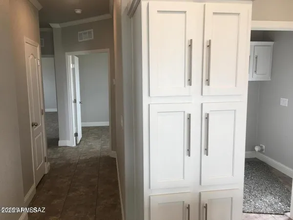 a utility room with washer and dryer