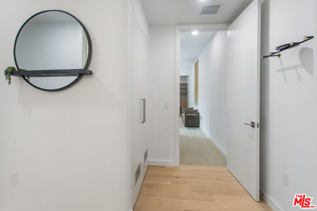 10310 Santa Monica Boulevard, Unit 612 Los Angeles, CA 90025 - Photo 20 of 37 a view of a mirror