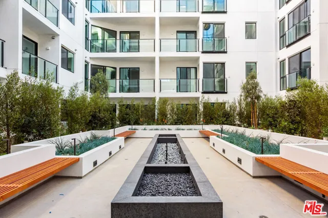 a view of balcony with furniture