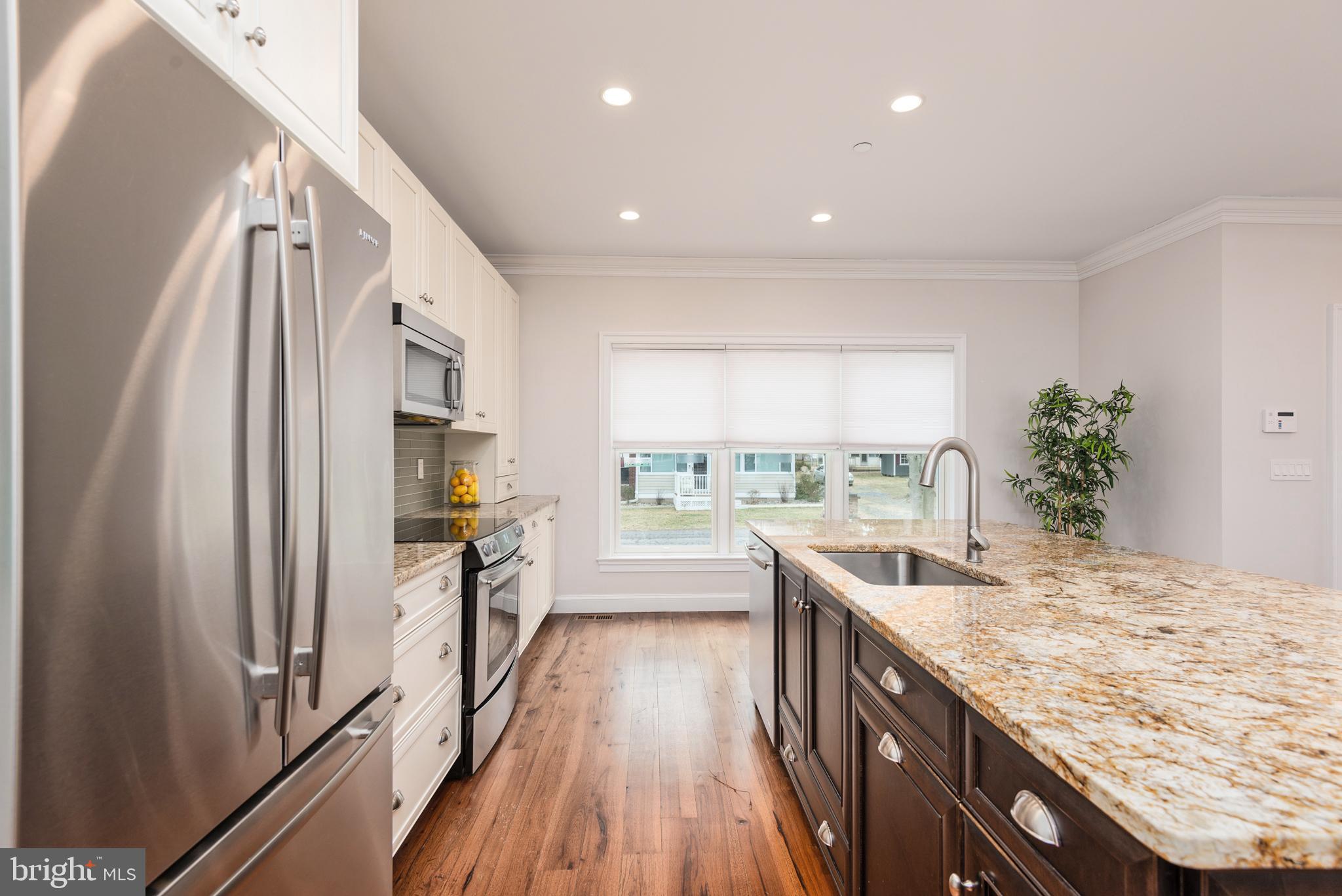 1538 Robinson Road Shady Side, MD 20764 - Photo 13 of 71 a kitchen with granite countertop counter space a sink appliances and cabinets