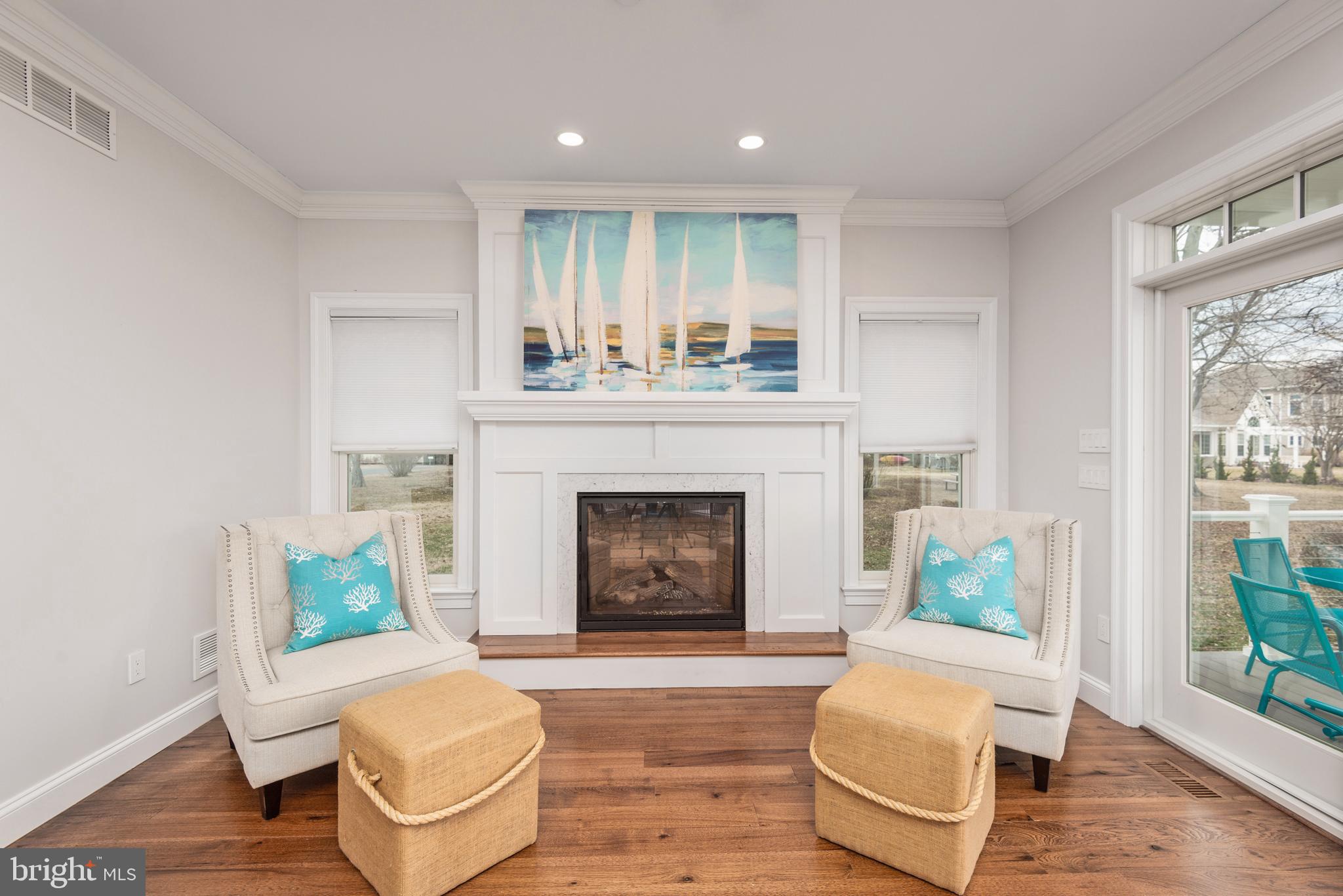 1538 Robinson Road Shady Side, MD 20764 - Photo 15 of 71 a living room with furniture and a fireplace