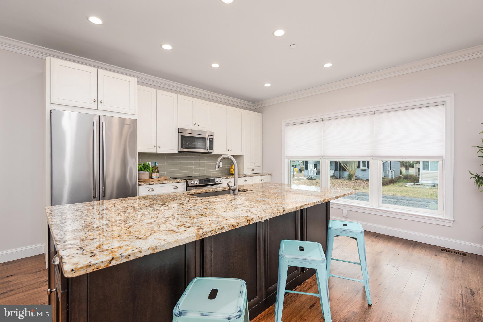 1538 Robinson Road Shady Side, MD 20764 - Photo 17 of 71 a kitchen with stainless steel appliances granite countertop a sink refrigerator and microwave