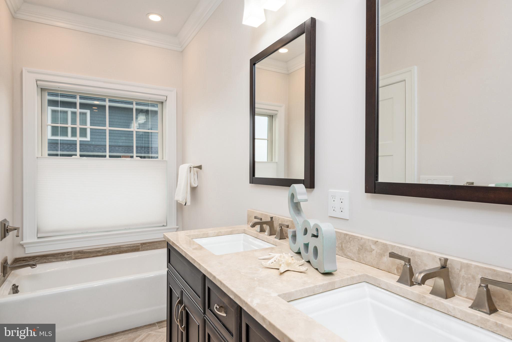1538 Robinson Road Shady Side, MD 20764 - Photo 28 of 71 a bathroom with a granite countertop sink and a mirror