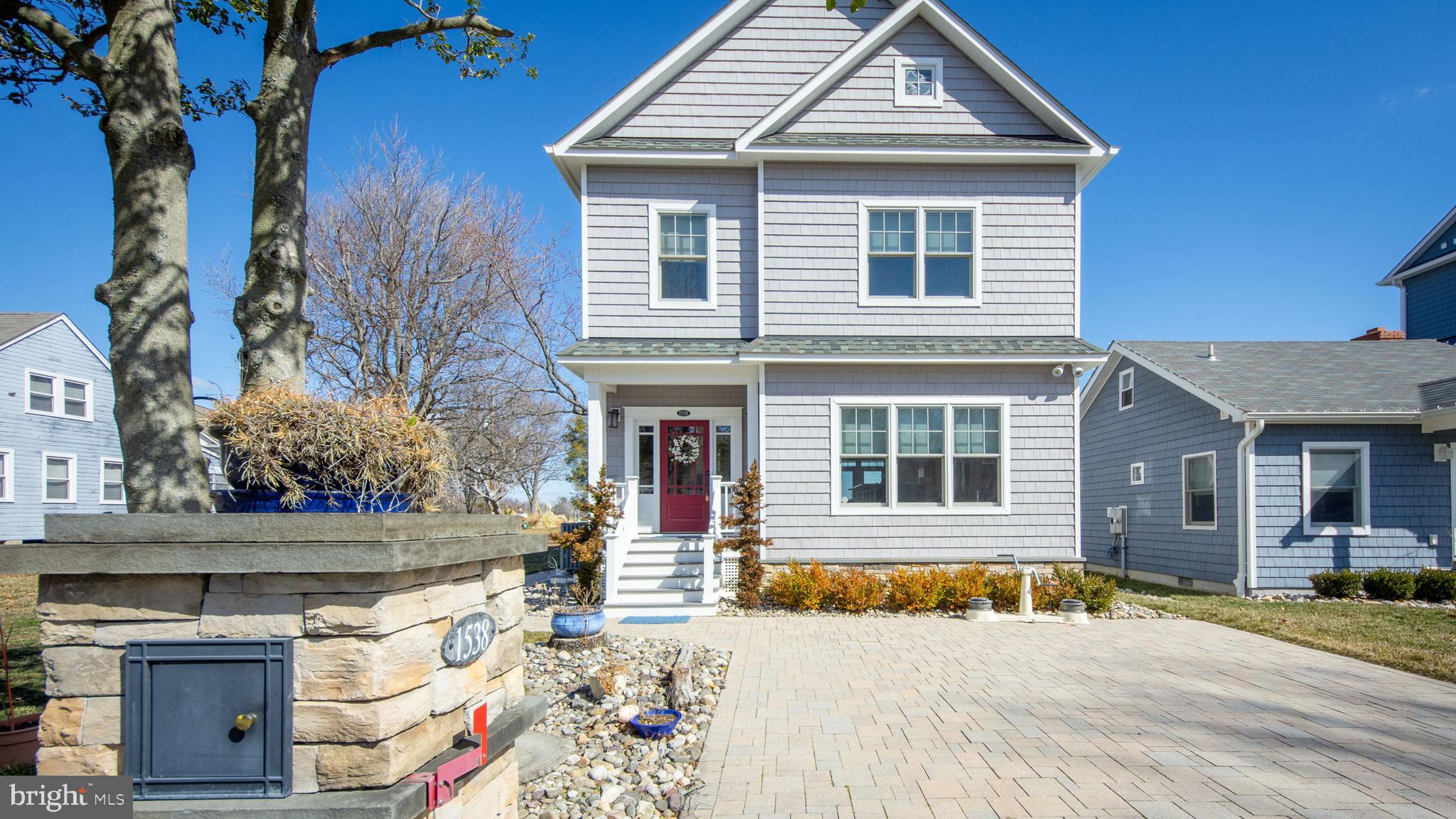 1538 Robinson Road Shady Side, MD 20764 - Photo 42 of 71 a front view of a house with a yard