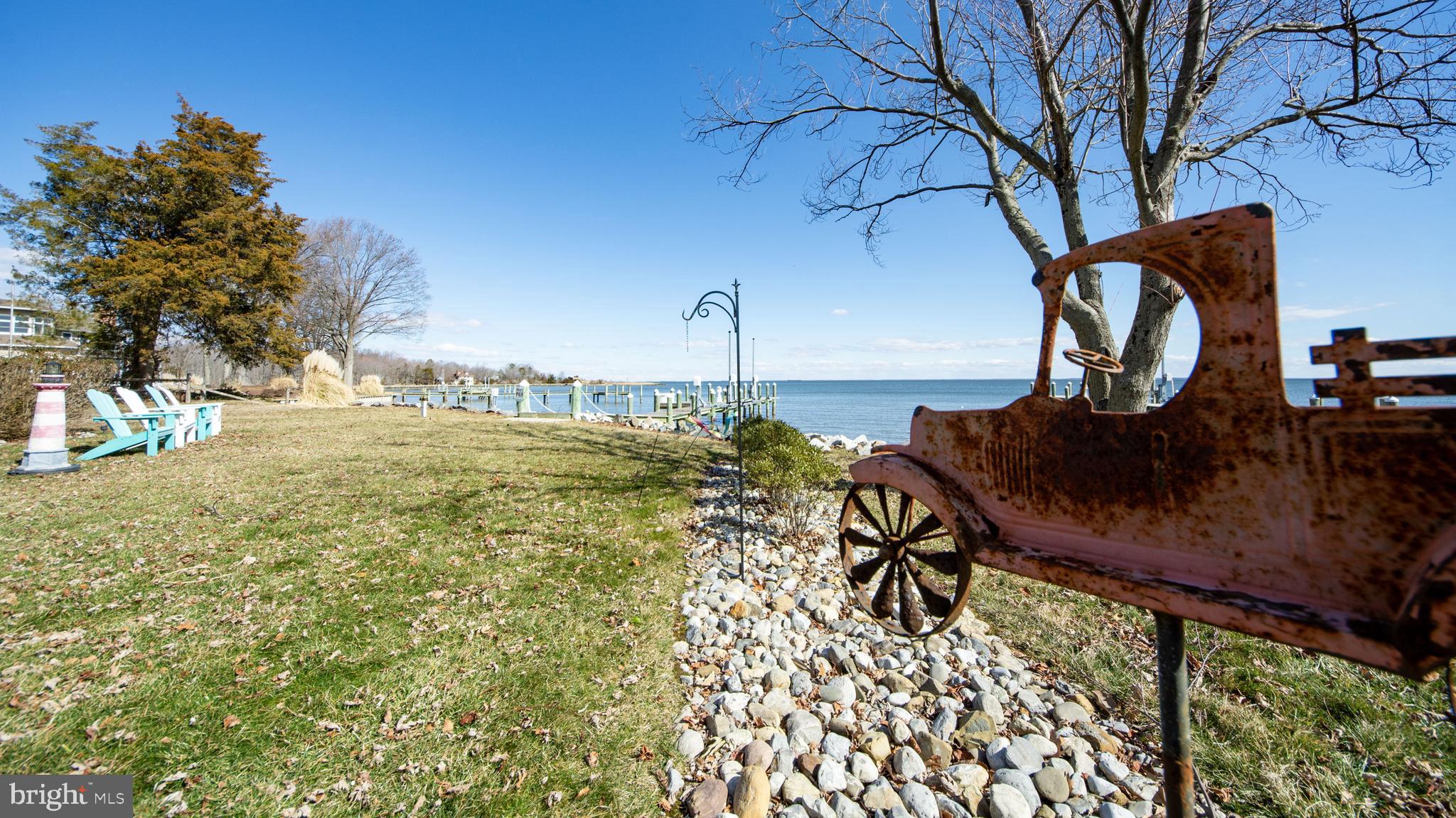 1538 Robinson Road Shady Side, MD 20764 - Photo 56 of 71 a view of a swimming pool with a table and chairs