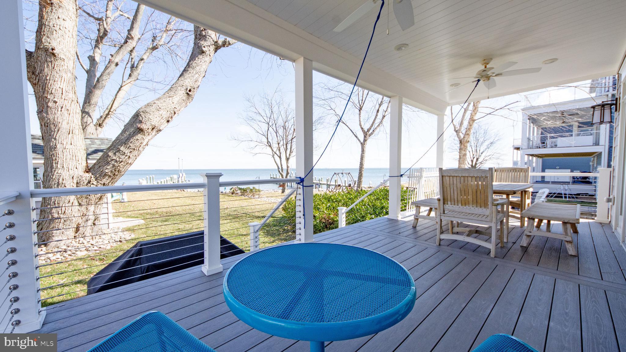 1538 Robinson Road Shady Side, MD 20764 - Photo 59 of 71 a view of a dining room with furniture window and wooden floor