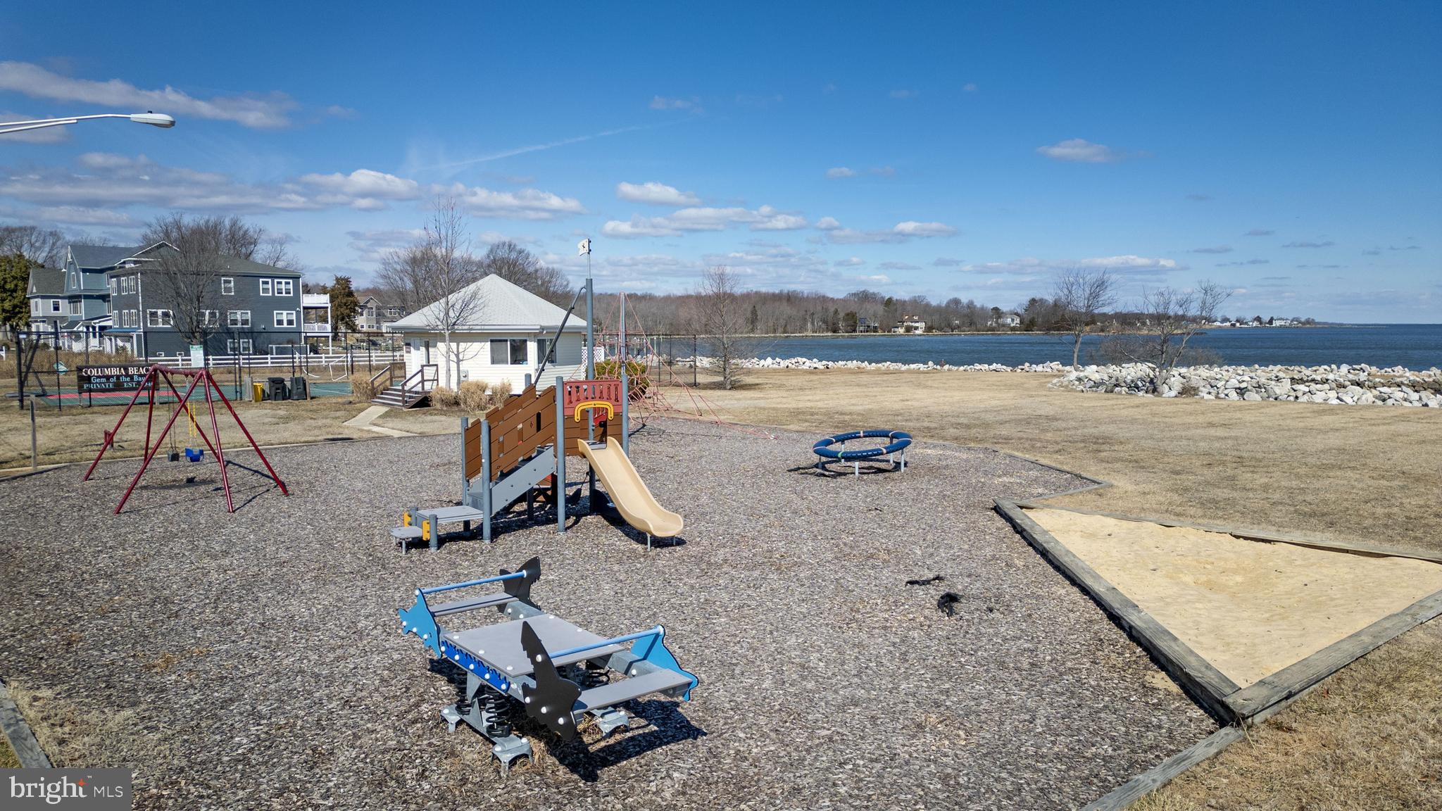 1538 Robinson Road Shady Side, MD 20764 - Photo 70 of 71 a view of a lake with a terrace