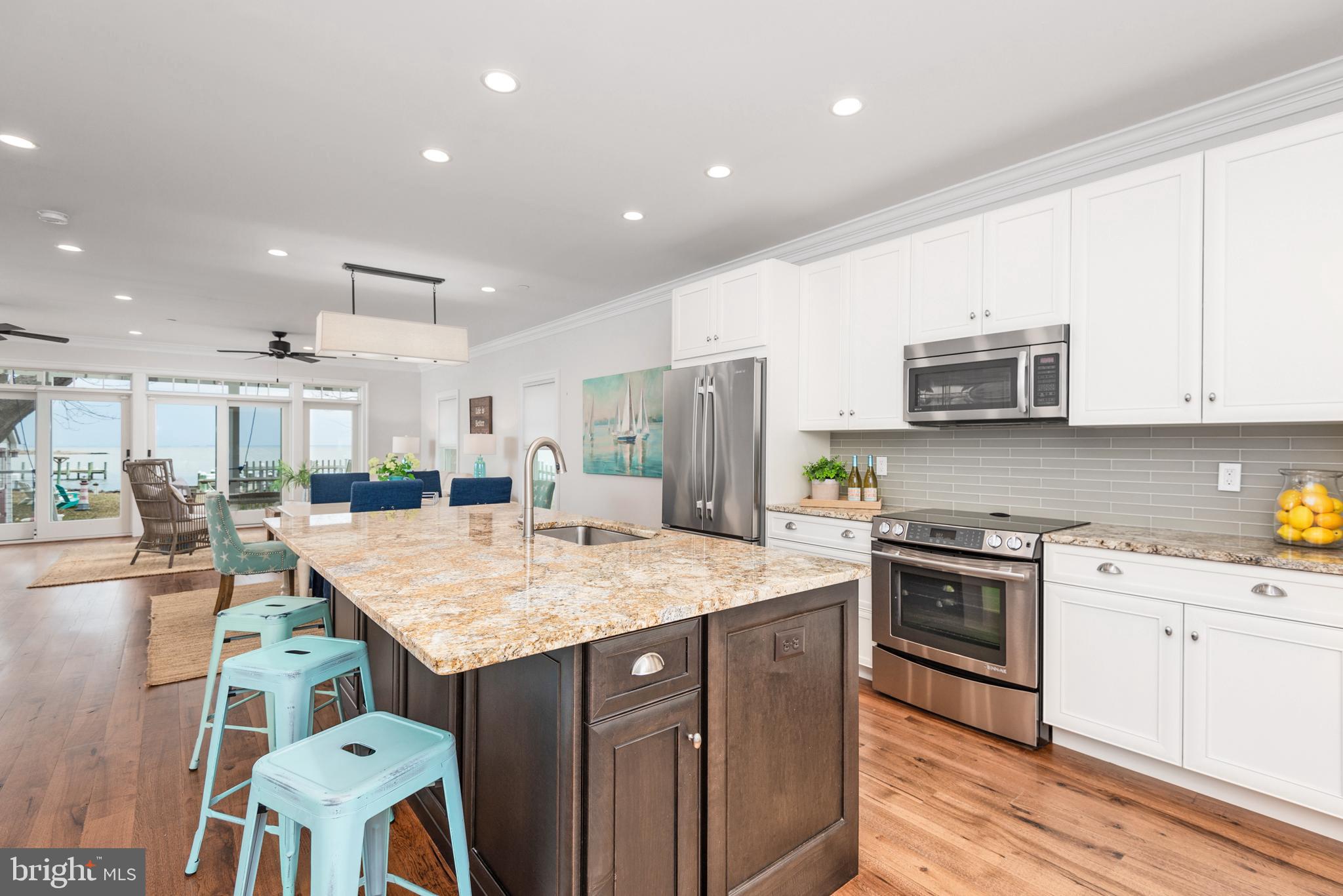 1538 Robinson Road Shady Side, MD 20764 - Photo 8 of 71 a kitchen with a sink stove and refrigerator
