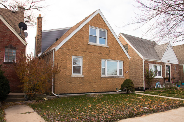 3943 West 83rd Street Chicago, IL 60652 - Photo 1 of 16 a view of a house with backyard