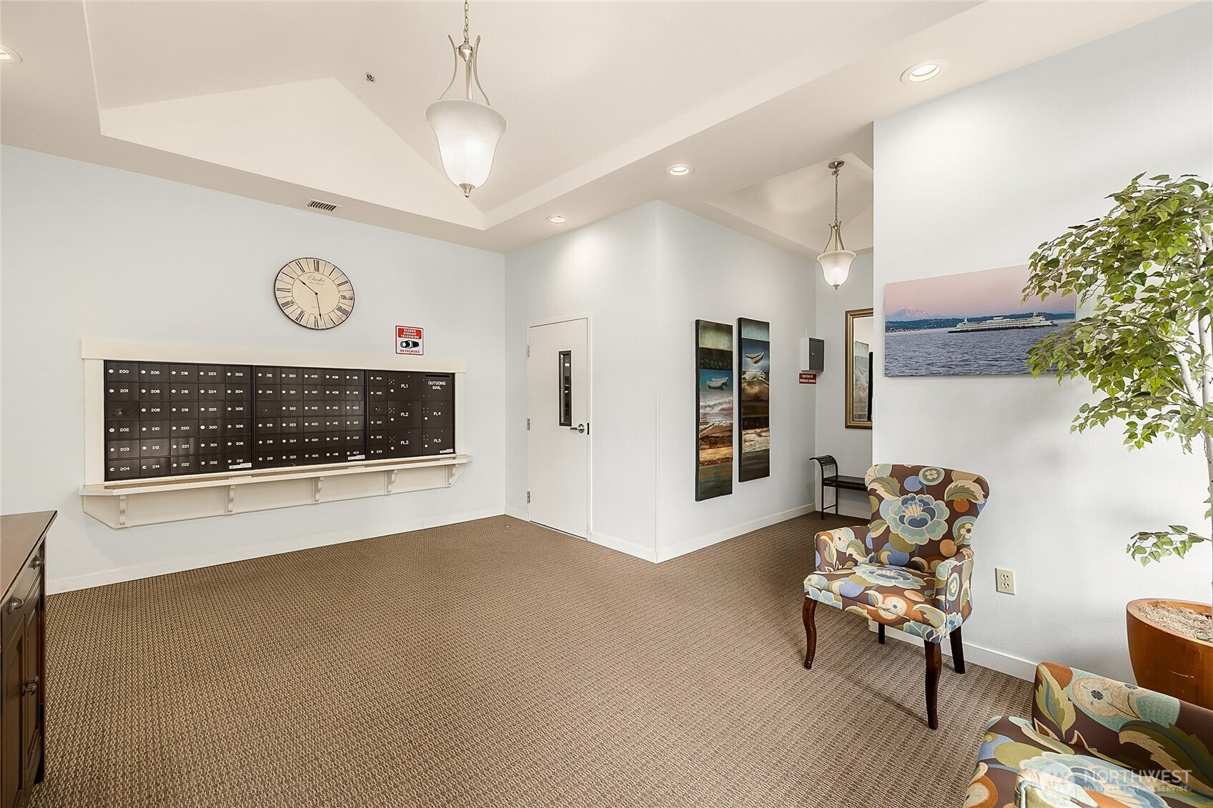300 High School Road Northeast, Unit 304 Bainbridge Island, WA 98110 - Photo 5 of 23 a view of workspace with furniture and wooden floor
