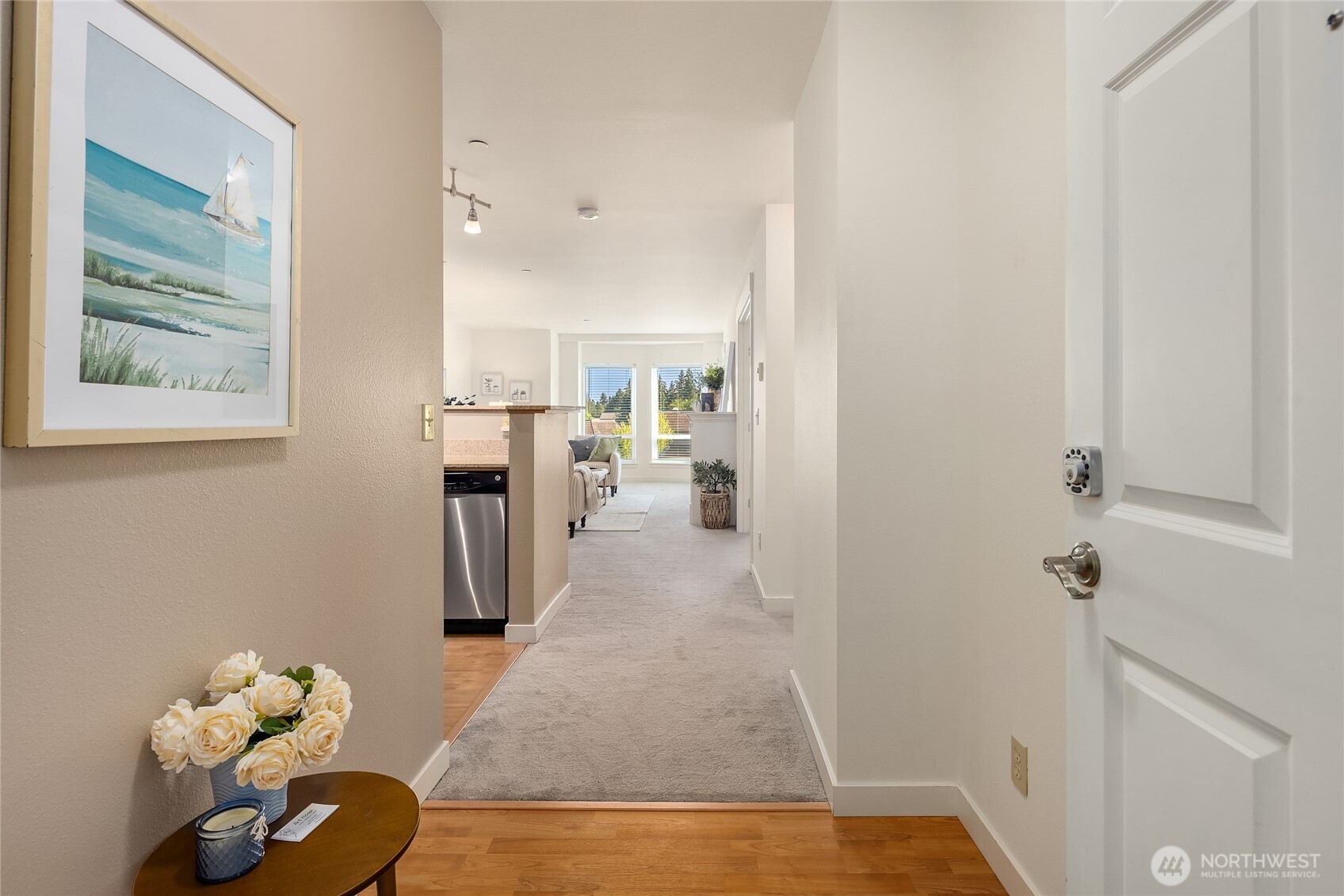 300 High School Road Northeast, Unit 304 Bainbridge Island, WA 98110 - Photo 6 of 23 a view of hallway with livingroom and furniture