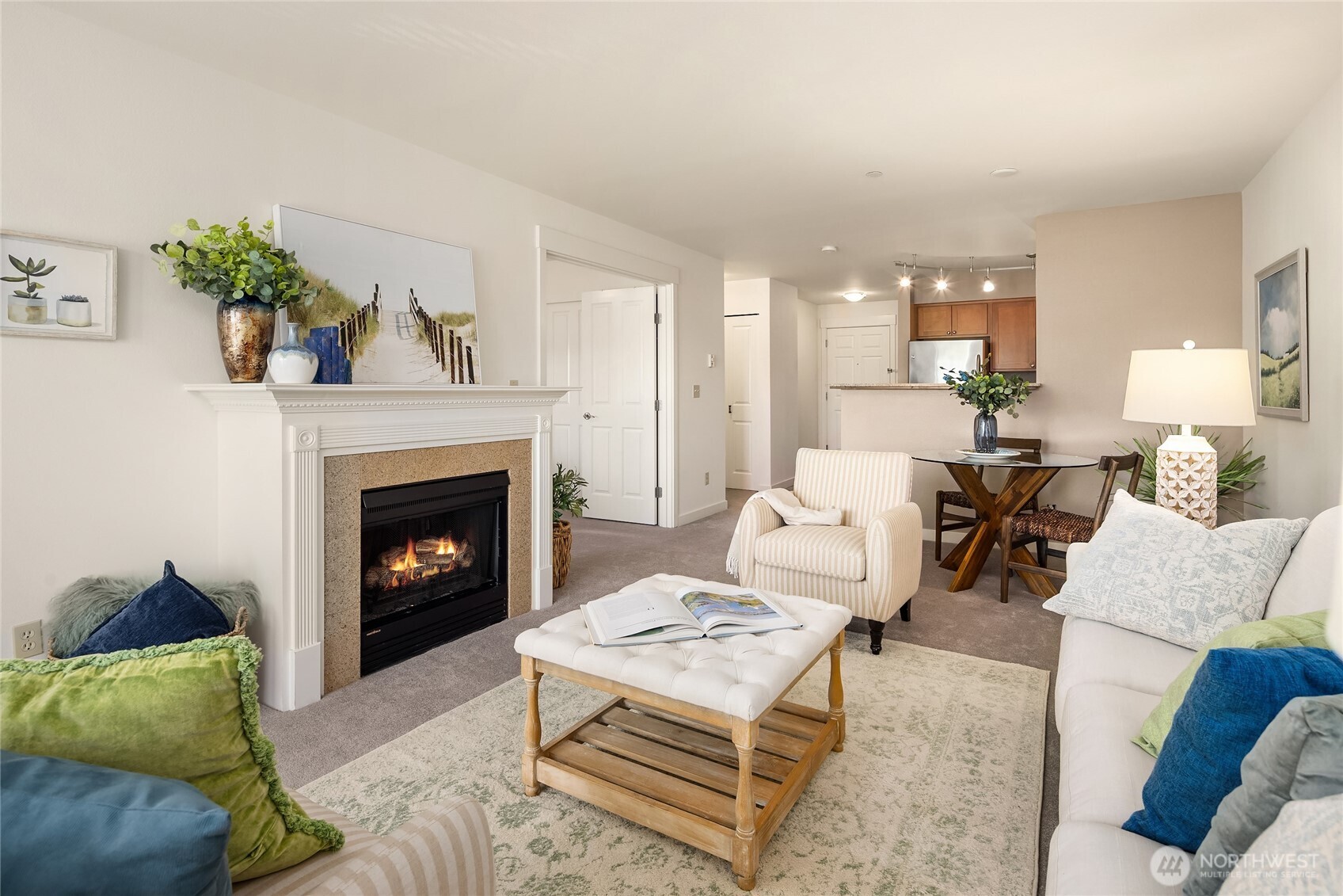 300 High School Road Northeast, Unit 304 Bainbridge Island, WA 98110 - Photo 10 of 23 a living room with furniture and a fireplace