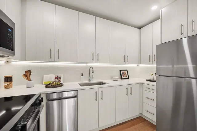 a bathroom with a sink and mirror