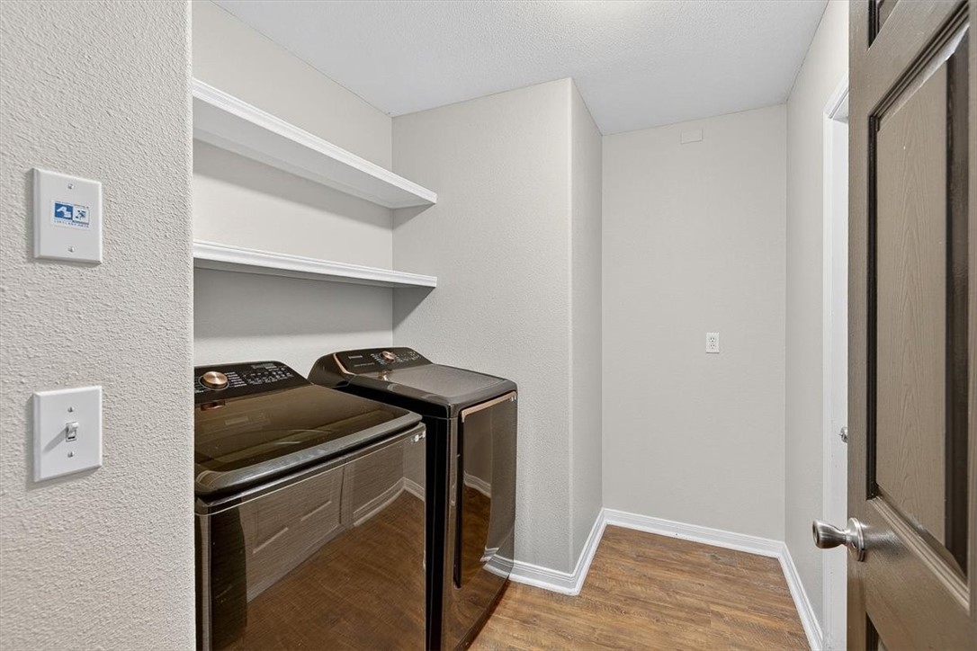 7506 Exeter Corpus Christi, TX 78414 - Photo 18 of 40 a kitchen with a stove and a refrigerator