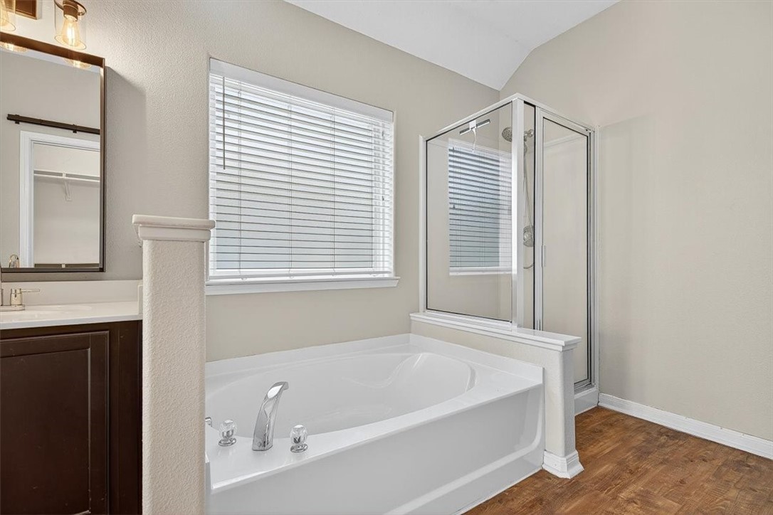 7506 Exeter Corpus Christi, TX 78414 - Photo 24 of 40 a white bath tub sitting next to a window