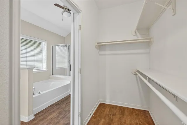 a bathroom with a bathtub and shower
