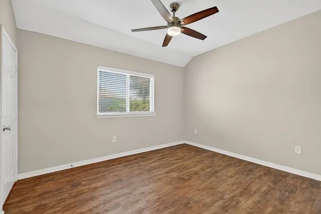 a view of a room with shelf on the wall