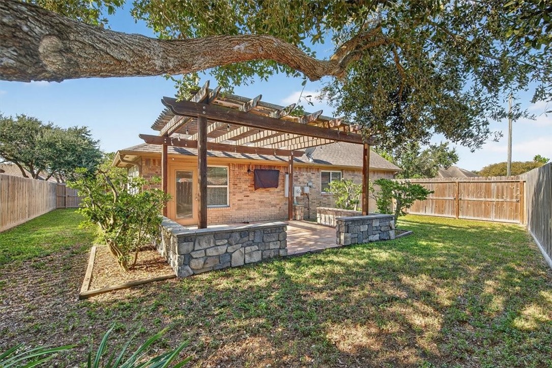 7506 Exeter Corpus Christi, TX 78414 - Photo 35 of 40 a view of a house with a yard porch and sitting area