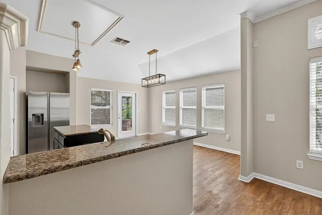 a large living room with a large window