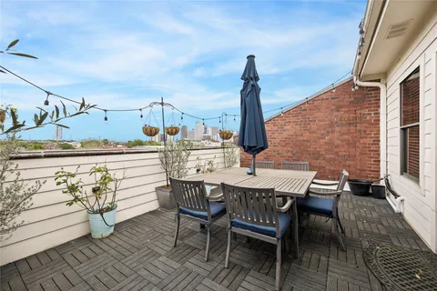 a view of a terrace with furniture