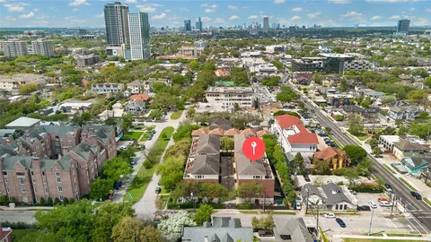 an aerial view of a city with lots of residential buildings