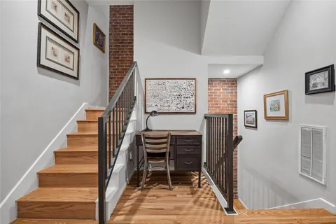 a view of entryway and workspace