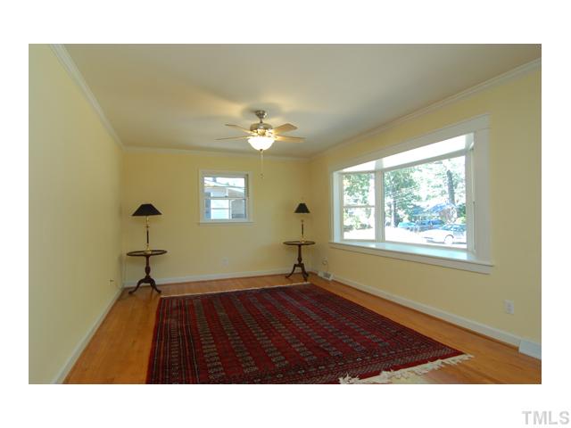516 Princeton Street Raleigh, NC 27609 - Photo 11 of 23 a bathroom with a sink and a window