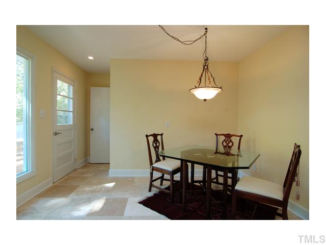 516 Princeton Street Raleigh, NC 27609 - Photo 8 of 23 a dining room with furniture and window