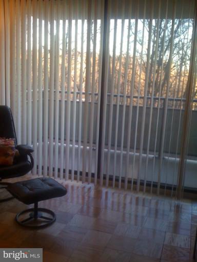 5225 Pooks Hill Road, Unit 406N Bethesda, MD 20814 - Photo 5 of 18 a view of a porch with wooden floor