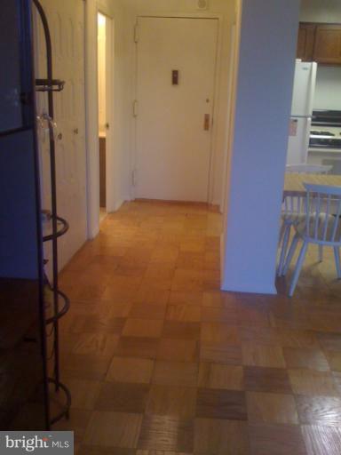 5225 Pooks Hill Road, Unit 406N Bethesda, MD 20814 - Photo 8 of 18 a view of hallway with stairs