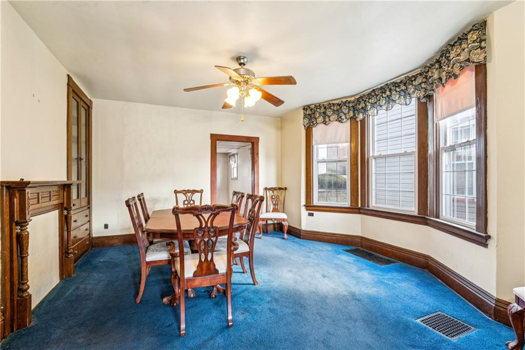 1369 5th Avenue Freedom, PA 15042 - Photo 18 of 41 a view of a dining room with furniture window and wooden floor