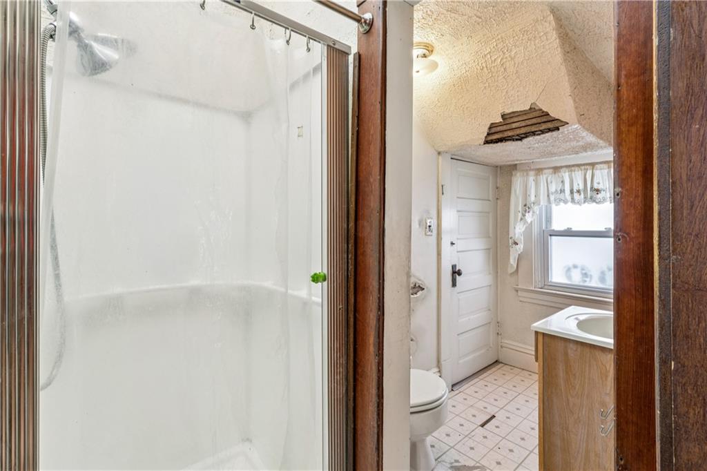 1369 5th Avenue Freedom, PA 15042 - Photo 27 of 41 a bathroom with a sink and a mirror