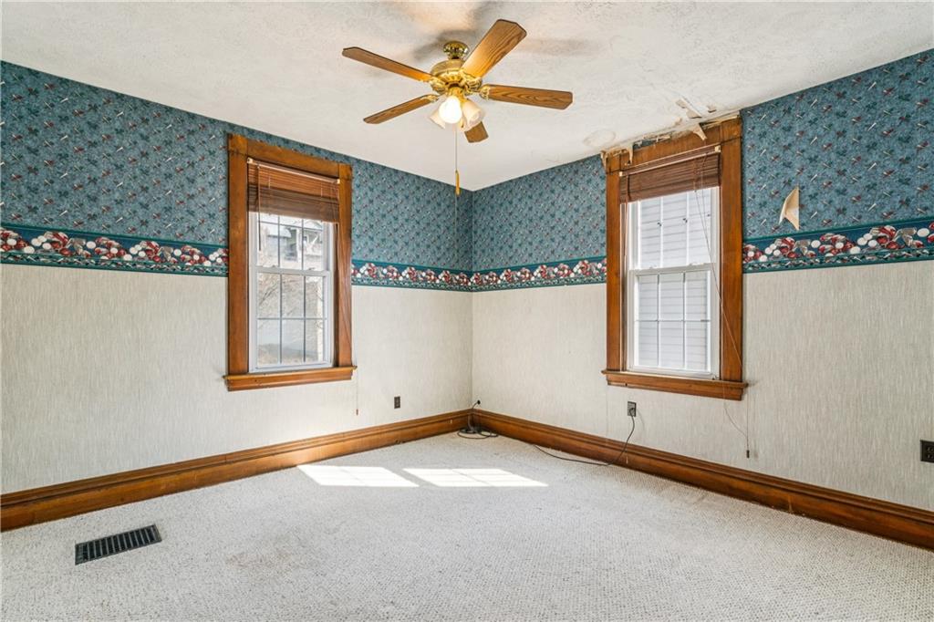 1369 5th Avenue Freedom, PA 15042 - Photo 28 of 41 a view of a livingroom with a window and a ceiling fan