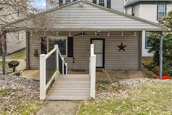 a view of a house with wooden door