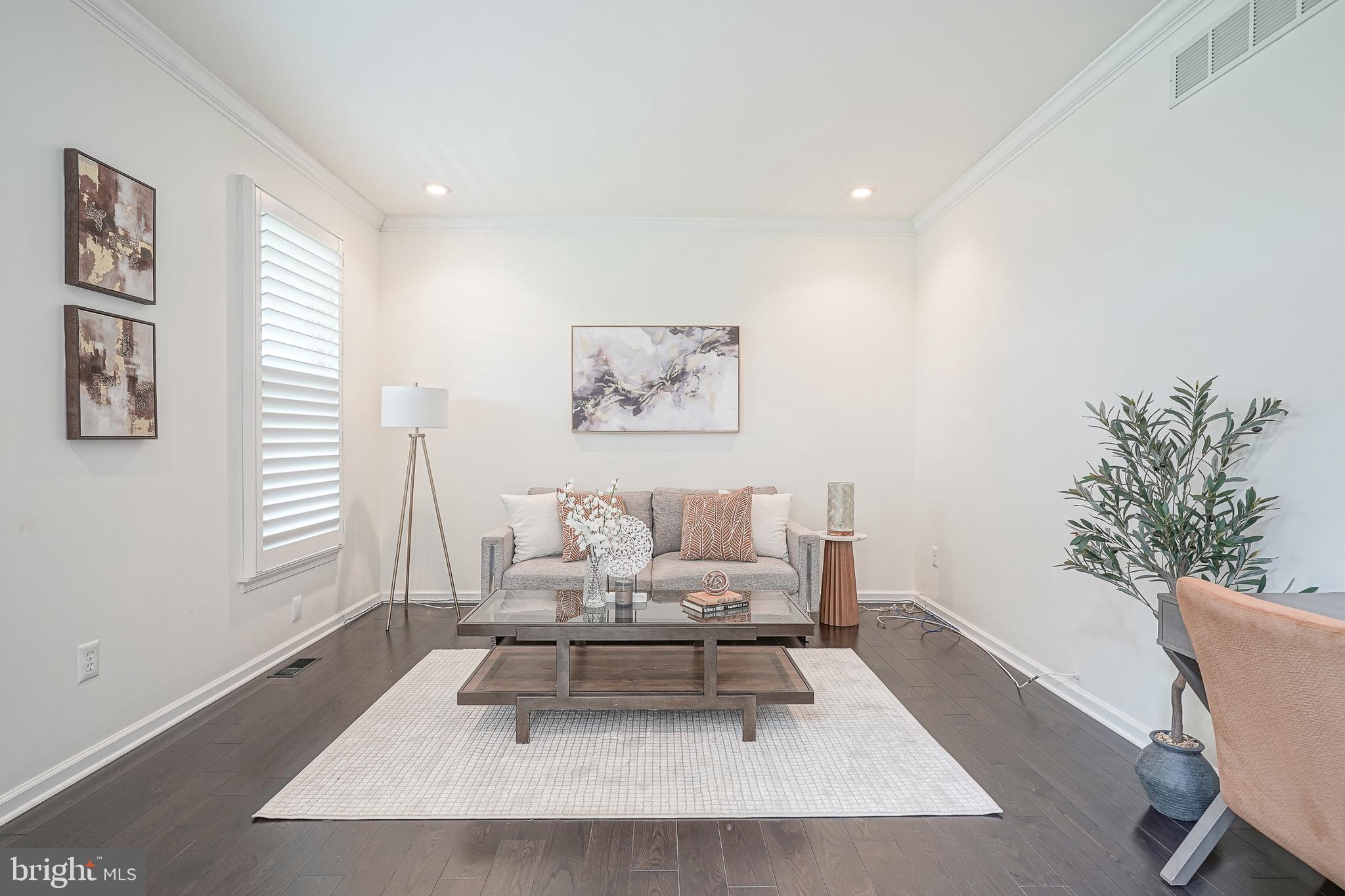 6101 Church Road Mount Laurel, NJ 08054 - Photo 13 of 64 a living room with furniture and a potted plant