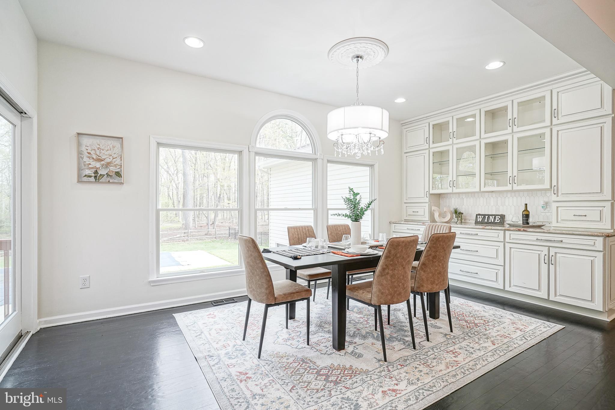 6101 Church Road Mount Laurel, NJ 08054 - Photo 22 of 64 a view of a dining room with furniture window and wooden floor