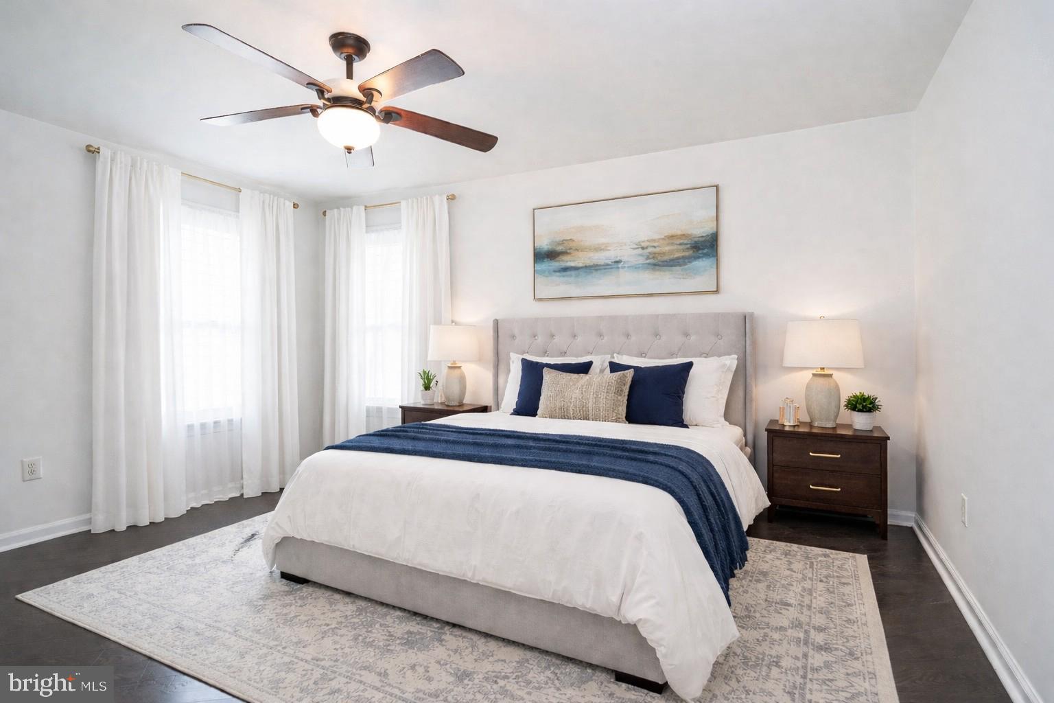 6101 Church Road Mount Laurel, NJ 08054 - Photo 36 of 64 a spacious bedroom with a bed and a chandelier